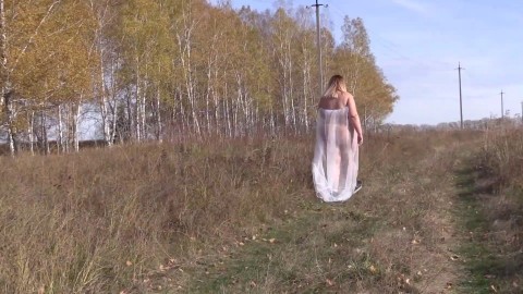 Exhibitionism in Russian. Almost naked beautiful BBW with a big butt walks outdoors on a public road. Fetish.