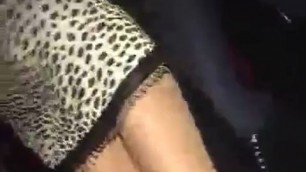 Dancing at a club in too short dress and stockings