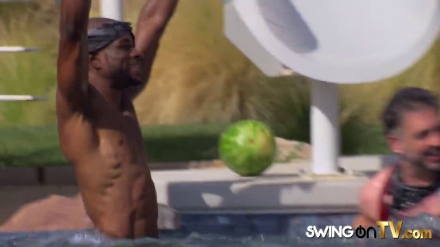 Laura and Brett head out to the pool for pre party fun with other swingers