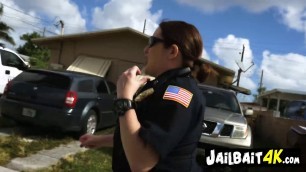 Black dude fucks really hard a redhead horny cop in doggy style outdoors during a police operation.