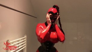 Inflatable figure pants under a big boob catsuit