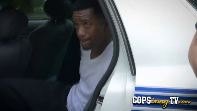 The police car arrives at the hood with a black dude and two horny cops that fuck him hard.