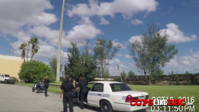 Illegal bike is getting his cock sucked by two horny MILFs after being apprehended.