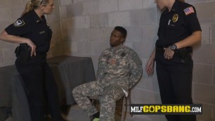 Bogus soldier is persuaded into making his cock hard for milf cops