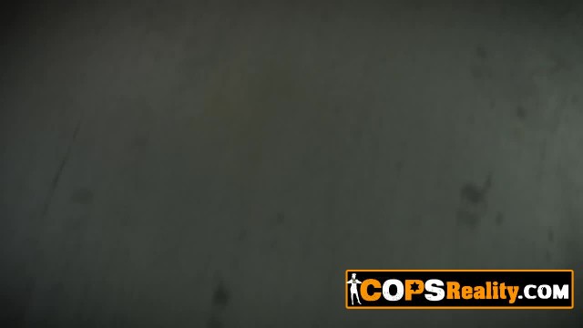A brunette MILF and her bouncy tits are getting fucked hard by a horny black suspect.
