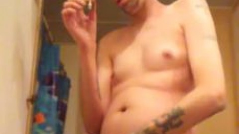 Strip Tease Male Stoner Smoking a Joint and Stroking his Uncut Cock