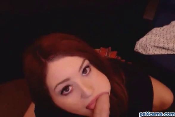Redhead with big tits rides her dildo and moans on cam