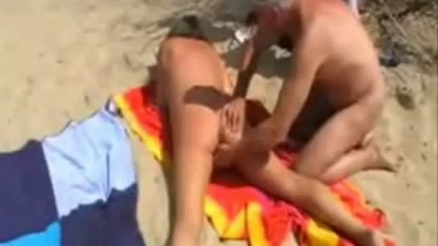 My slut mature bitch used by strangers at nude beach. Amateur home made
