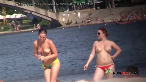Topless women on a nude beach.