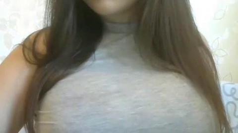 Amateur slut showed off incredible big round tits on webcam