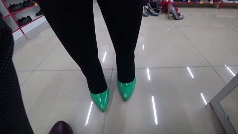 A foot fetish in a public place and a fetish with peeping under a short skirt. BBW with a big ass in a shoe store.