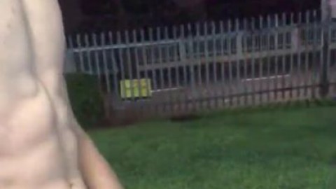 Cumming outside apartment building naked