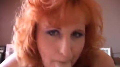 Raunchy redhead old spunker gives a sloppy blowjob and eats cum