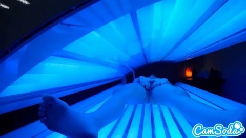 teen latina gets caught rubbing her clit while using a tanning bed