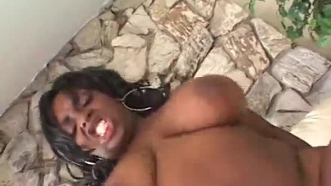 Ebony momma with huge knockers Ms Panther gets fucked on the couch by a white stud