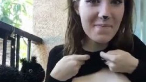 Young girl flashing round tits