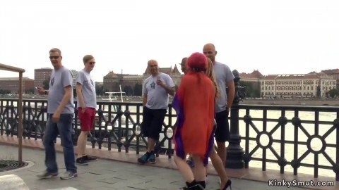Redhead slut gets gangbang in public