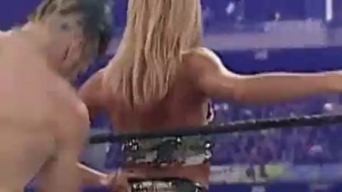 Stacy Keibler gets spanked while showing her ass.