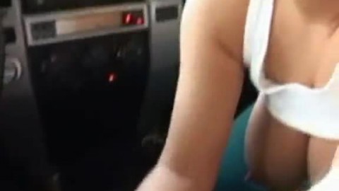 Busty amateur Brandy handjob her boyfriend in the car