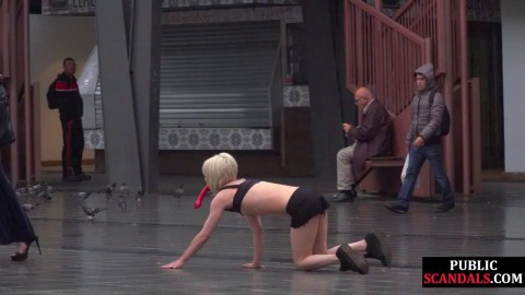 Public slut humiliated on the street by her strict domina