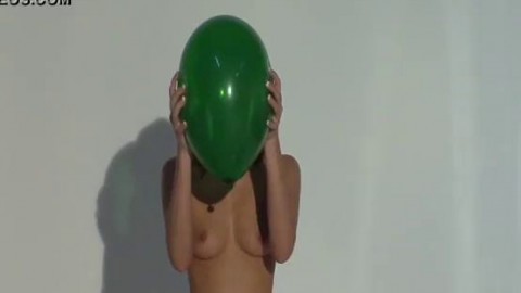 Teen pops balloon topless with nails
