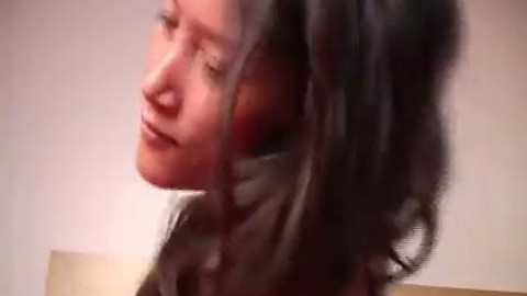 Cute Asian teen rubbing hard on her wet bald pussy