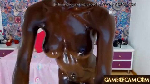 Jaw-dropping shining oily ebony college girl masturbates and squirts