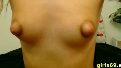 Naughty Babe with puffy nipples masturbating