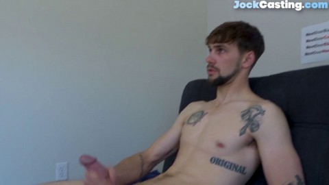 Bearded tattoo jock cums and strokes big dick at casting