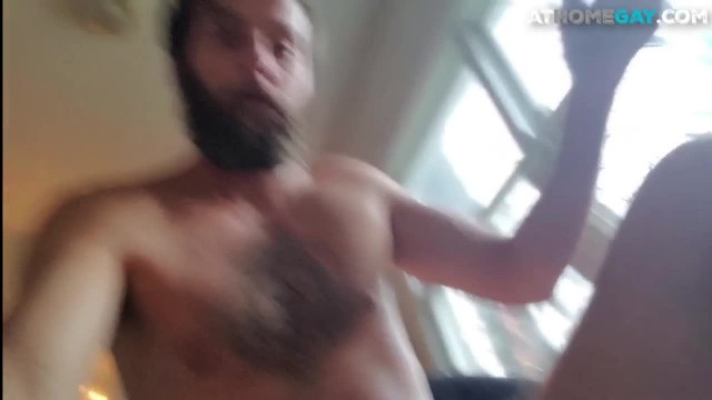 Bearded jock jerks and fingers his lubed asshole for jizz