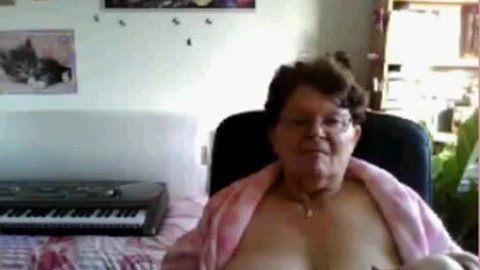 Naughty Granny Flashing Her Big Tits on Cam: Free Porn f6