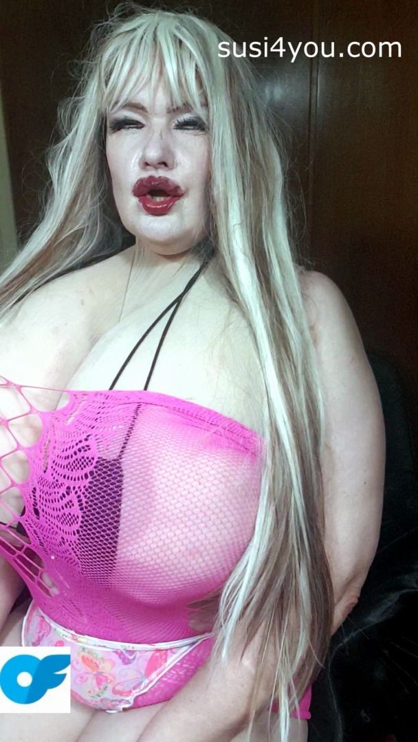 Susi is bouncing her tits. You see her in pink fishnet showing big muffin pussy