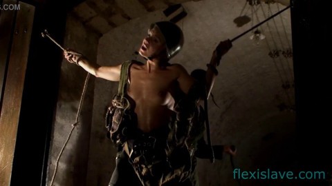 BDSM model Alex Zothberg punished by a soldier in basement1