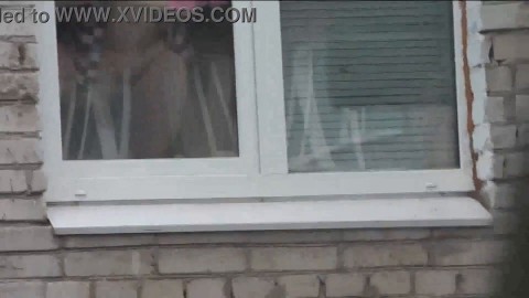 Naked in public. Nude. Outdoor. Outside. Husband Sexy Frina is spying on her from car window when she washes apartment window no
