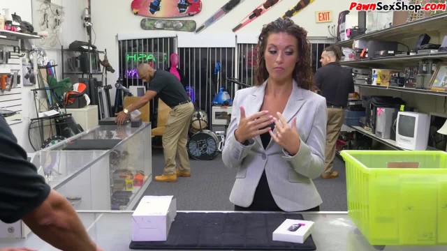 Tattooed amateur babe rides cock in office of the pawn shop