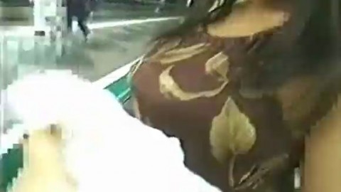 Shameless Japanese nympho gets on escalator and strips naked