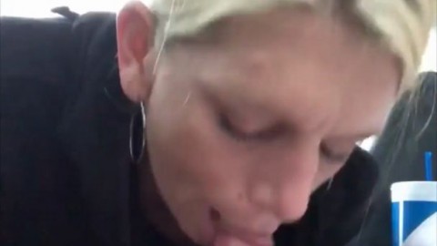 Blonde Pregnant streetwalker gives amazing head in a car during the middle of the day