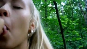 Hot blonde blows her boyfriend in the woods