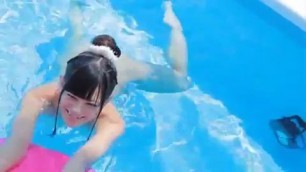 Young Japanese woman with beautiful ass in the pool small tits