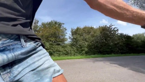 Guy biking in public in sheer pants