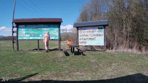 Naked in front of a tourist attraction