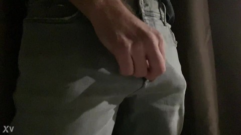 Pulling my impressive big cock out of grey jeans