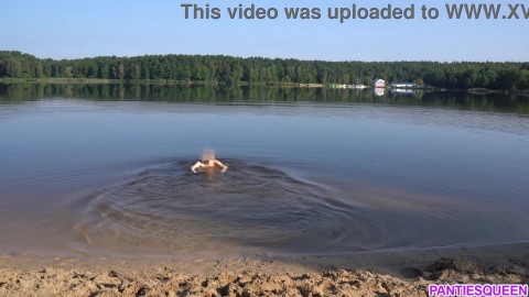 Naked girl goes skinny dipping in public beach