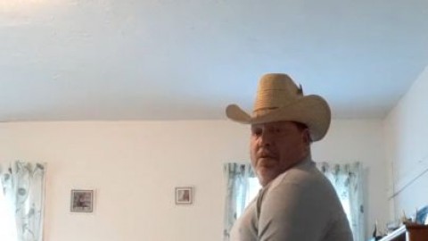 In cowboy hat