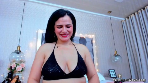 Big tits amateur MILF masturbates in bed on webcam