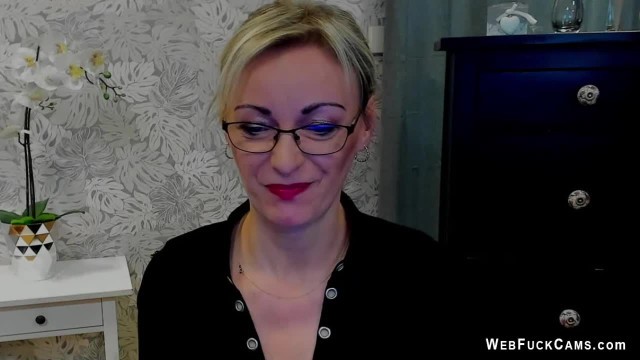 Clothed busty German MILF on webcam posing