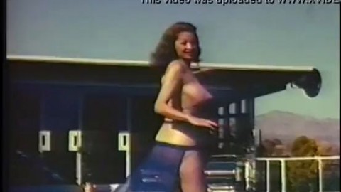 Chubby vintage model with big breasts and a gorgeous tight ass takes part in the shooting of a porn movie on the street porn