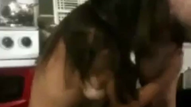 Couple Having Sex In The Kitchen