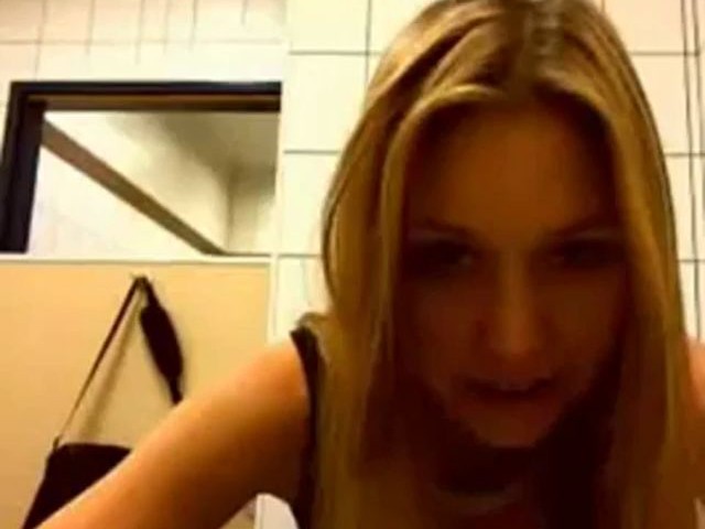 Blonde Teasing In A Public Washroom
