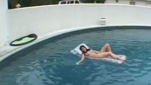 Pretty Girl On Float In Pool Talks On Cell Nude